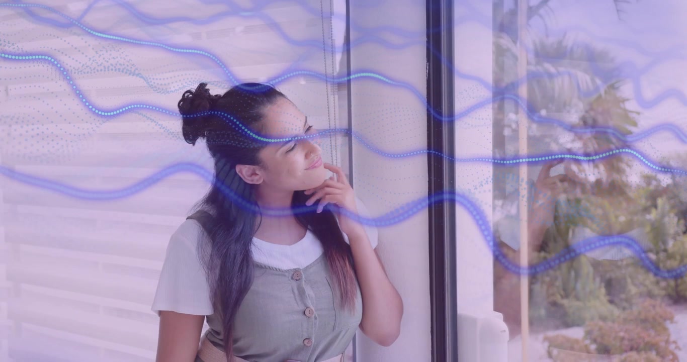Blue waveform flowing in technology causing woman by door resting chin gazing at garden smiling