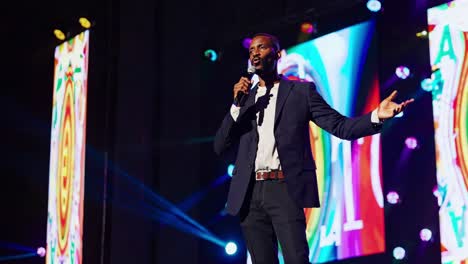 man giving a speech on stage