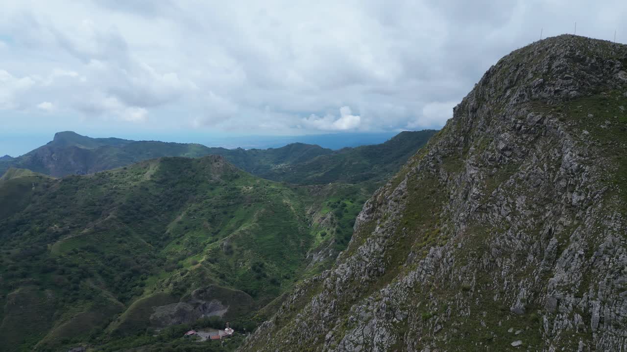 Aerial drone footage of the Sanctuary of Madonna dell’Aiuto, Sicily: hilltop church with scenic views over valleys and countryside. Perfect for travel, faith, and cultural projects