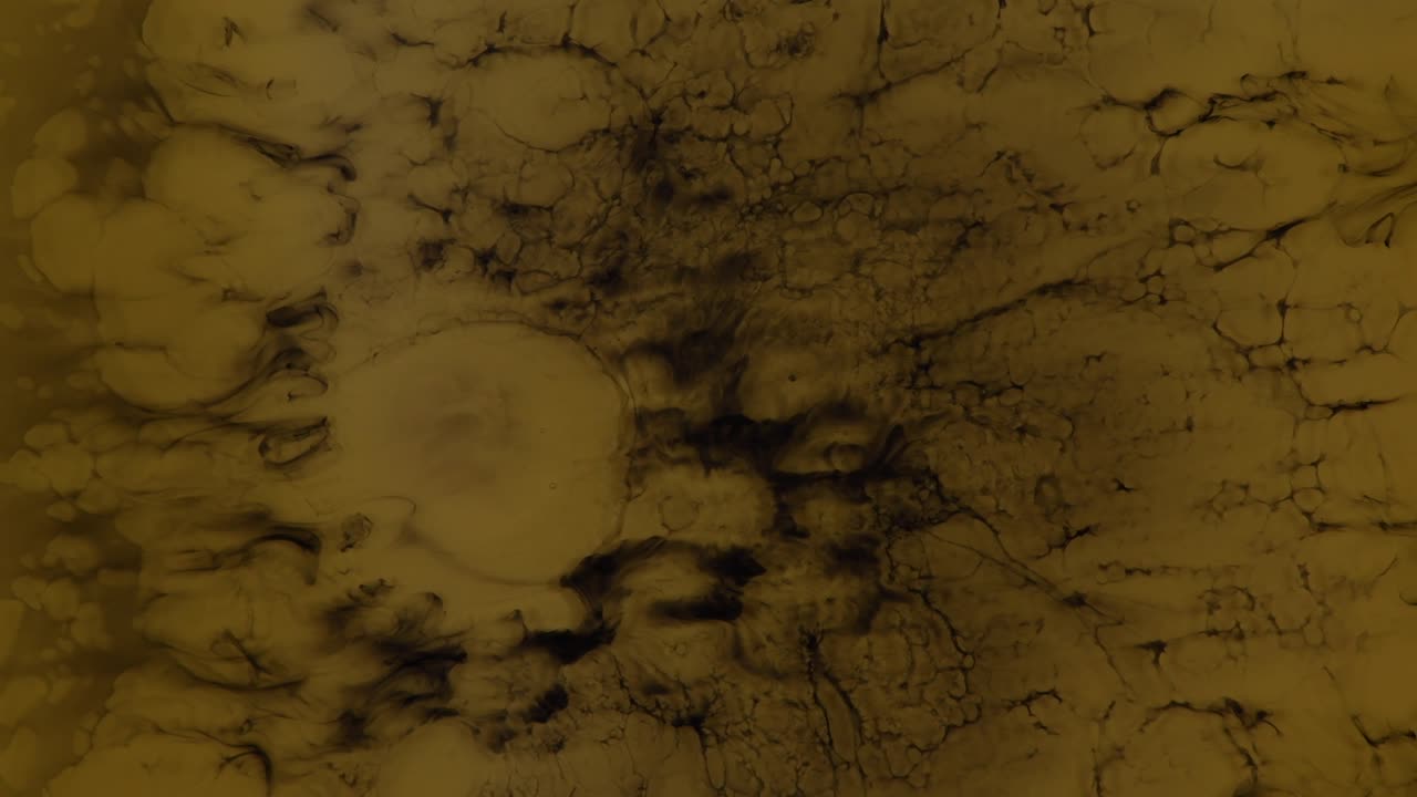 um complexo preto instável evolui sobre um fundo marrom taciturno