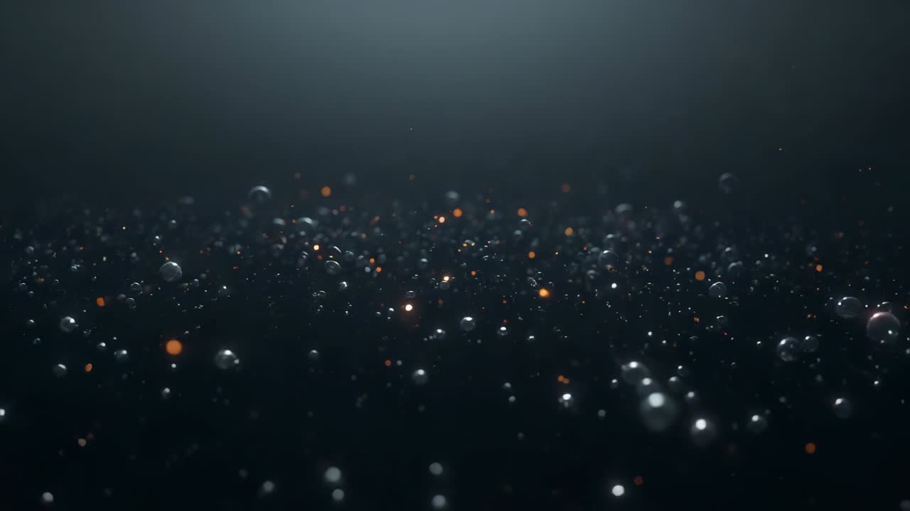 Starting with spread spheres, drifting field densifying in studio void, showing orange glints, haze