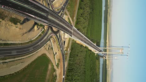 vertical: tulcea’s impressive braila bridge rises over the danube in romania