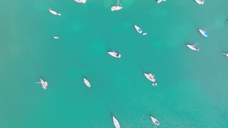 overhead view of sailboats in caribbean island