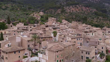 Fornalutx-is-a-scenic-mountain-village-in-Mallorca,-aerial