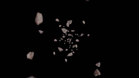 volando muchas piedras de roca en fondo negro. explosión de salpicaduras rotas. concepto de desafío. animación 3d de salpicadas de piedra girando. animación de bucle.