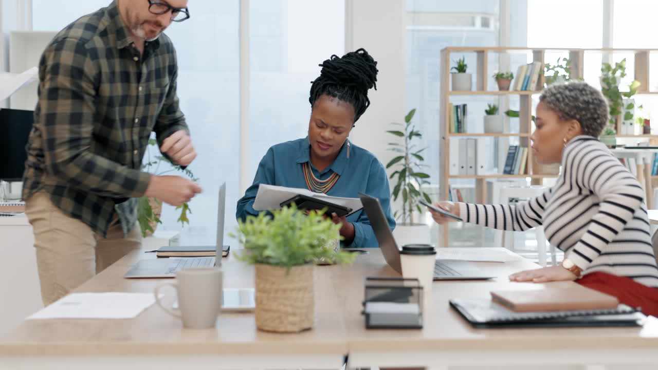 Staff, chaos and black woman multitasking