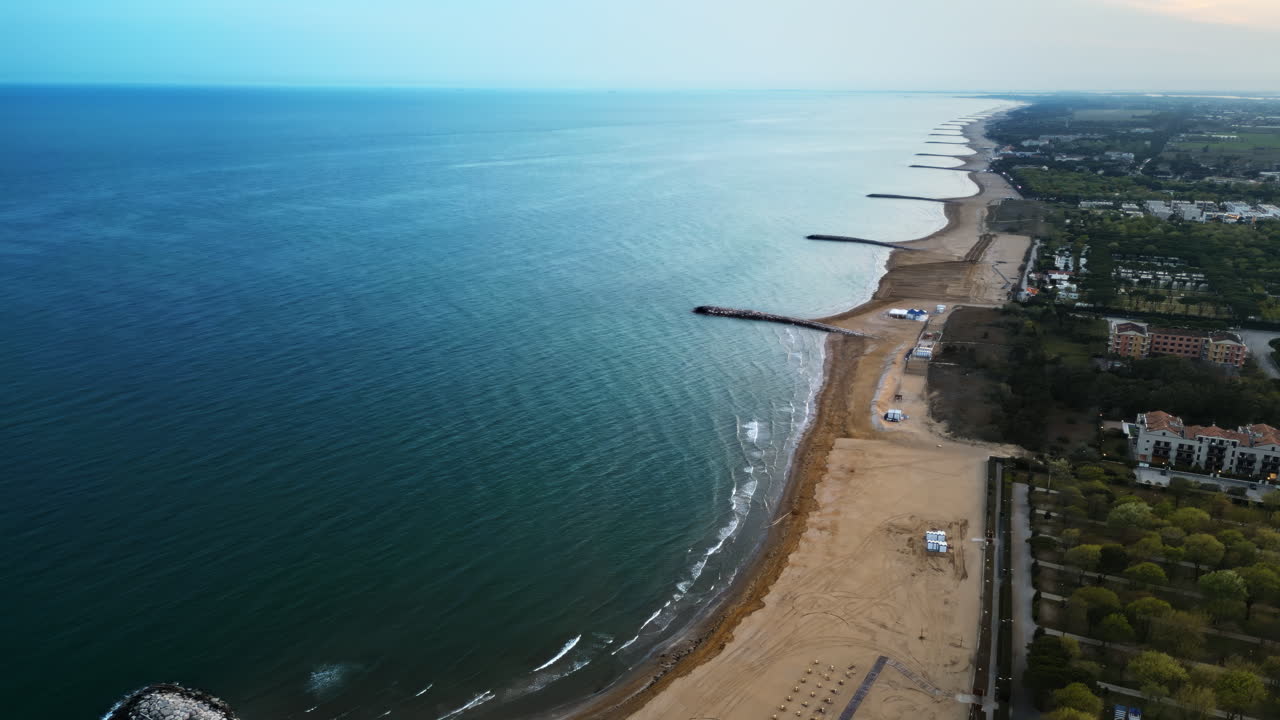 Aerial drone view of the Cavallino-Treporti beach on the Adriatic Coast in the evening