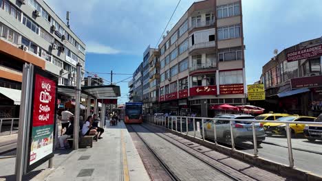 a vibrant view of antalya’s city center featuring the modern tramway, a blend of urban life and scenic surroundings.