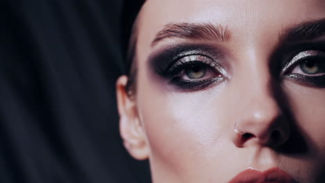 close-up portrait of a woman with dramatic makeup