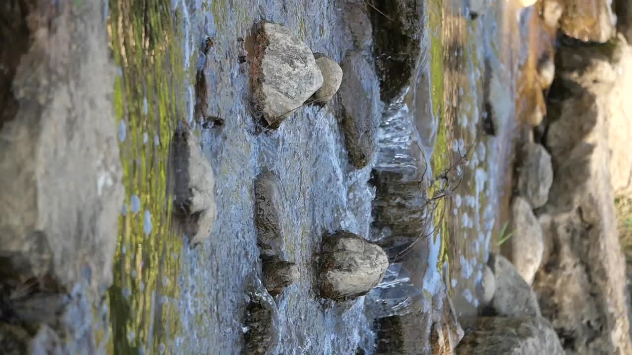 Waterfall with Rocks and Moss