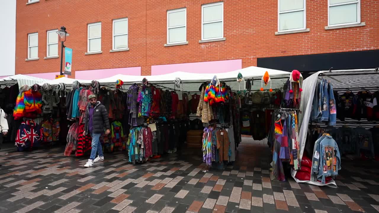 Colorful Street Market with Clothing and Accessories