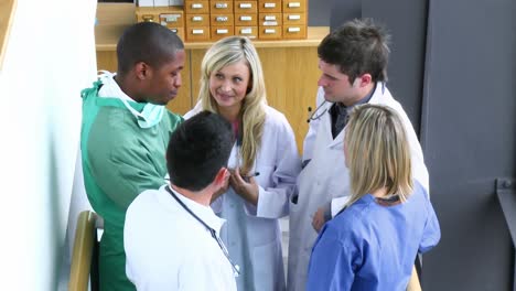 medical team speaking in the stairs of a hospital footage