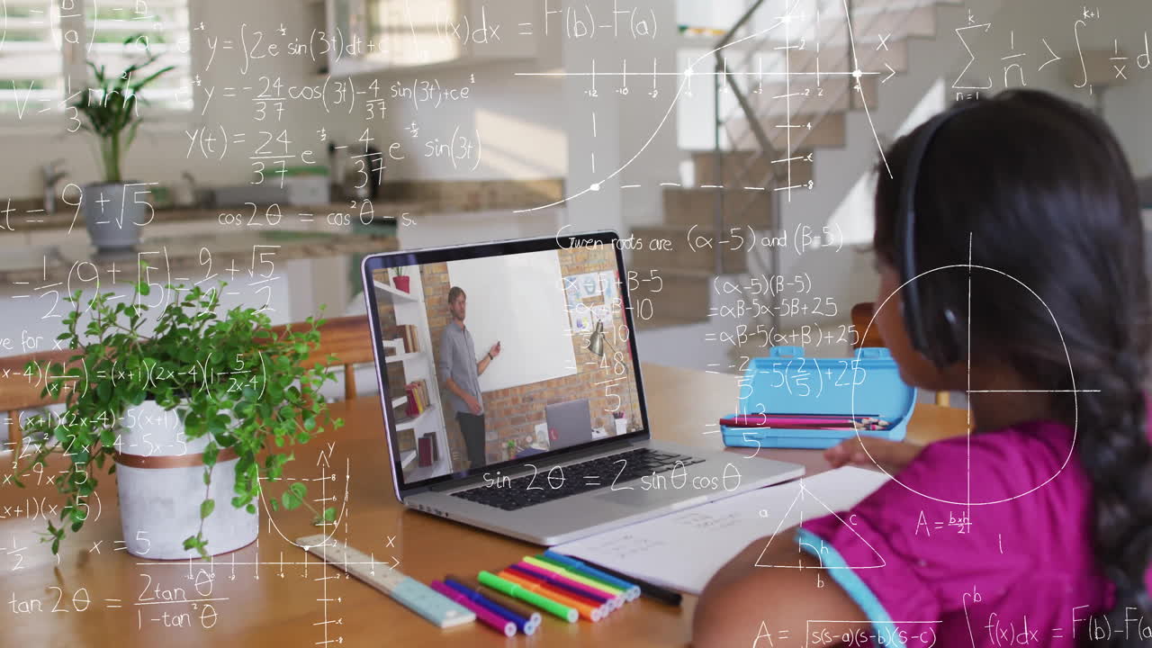 In school, child learning math online with animation equations on laptop screen