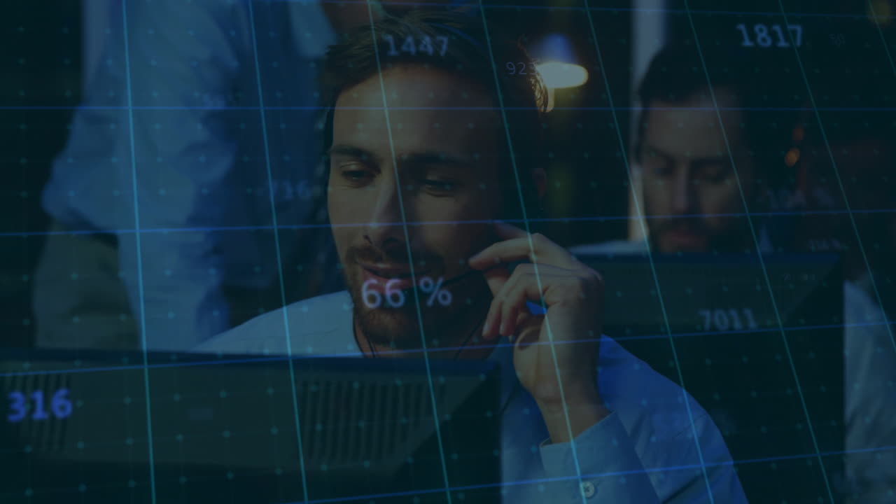 Business professionals working at computers with data processing animation overlay