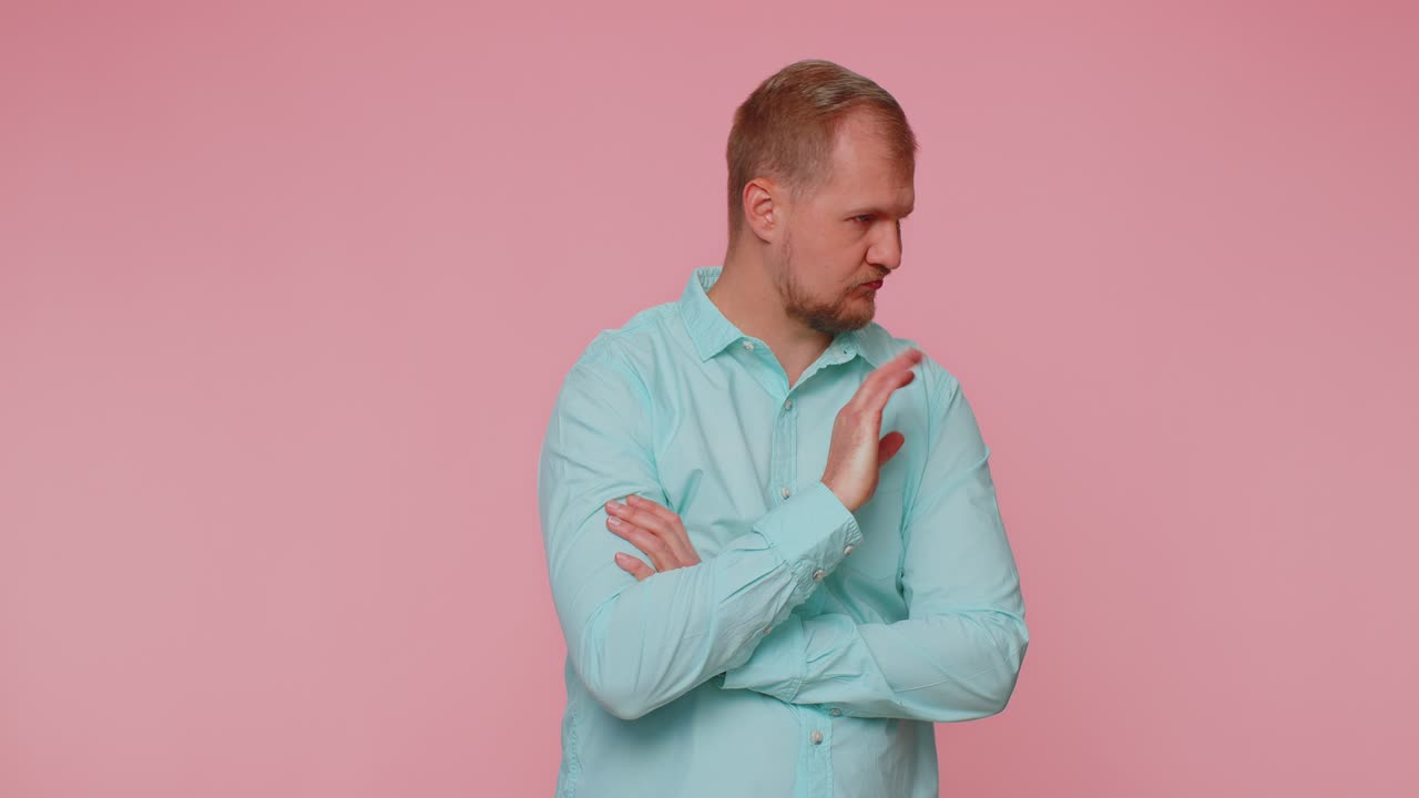 Dissatisfied man shaking head no expressing irritation feeling bored disappointed results bad news