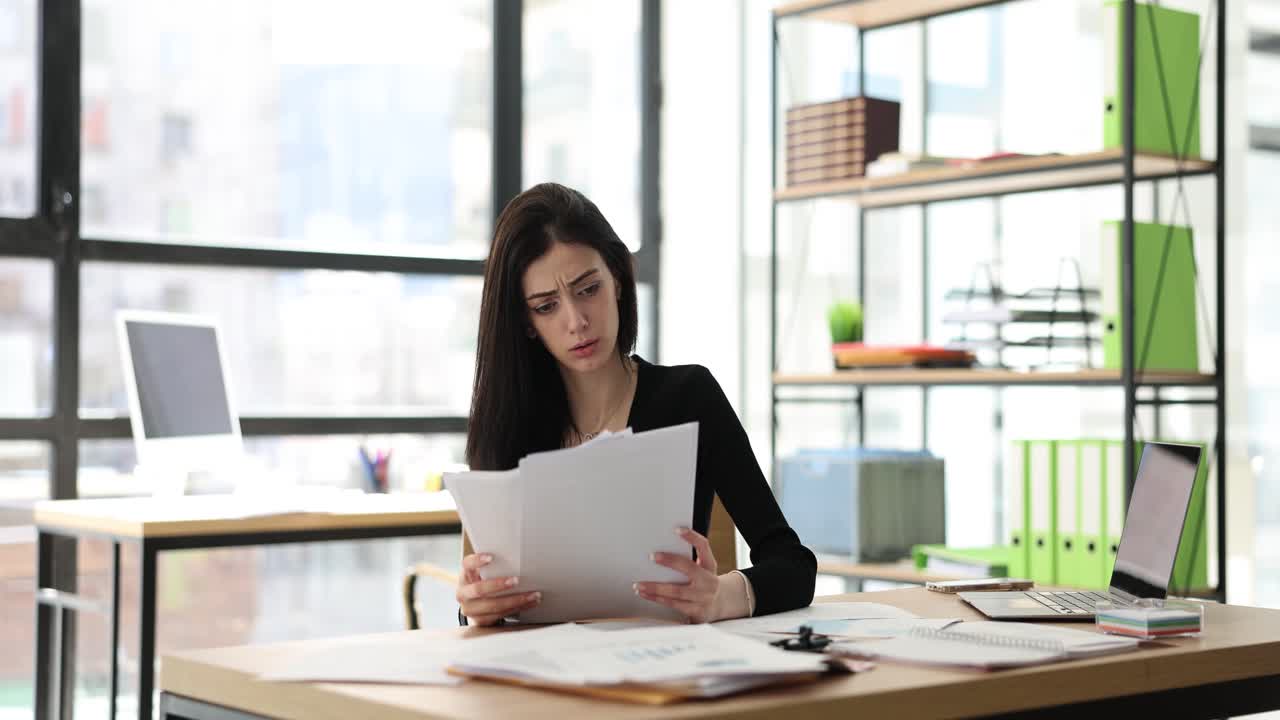 Worried woman in office