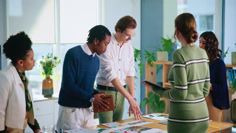 diverse business team discussing a project in a modern office