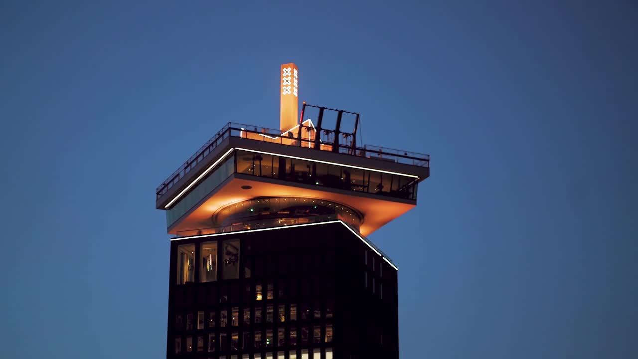 View of rooftop terrace and sky deck of Adam lookout tower in Amsterdam during twilight