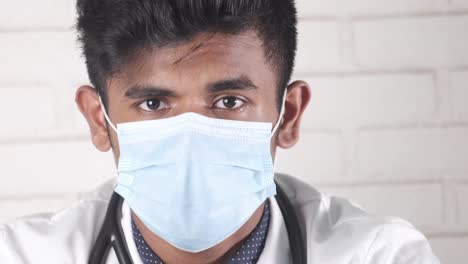 worried doctor in medical mask