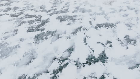 drone footage capturing the mesmerizing ice-covered panorama of lake michigan