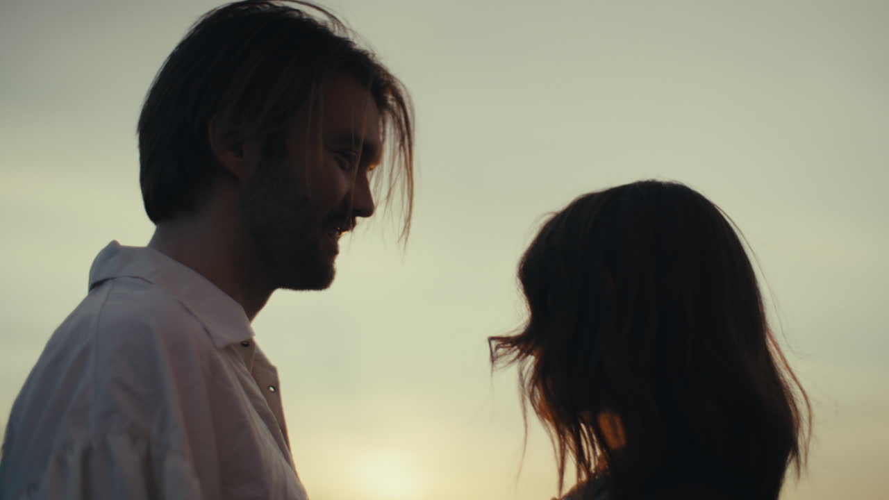 Couple's Romantic Sunset Silhouette