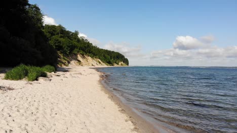beautiful beach in northern germany, schleswig-holstein called noer beach on the baltic sea.drone flies from right to the left in a low altitude