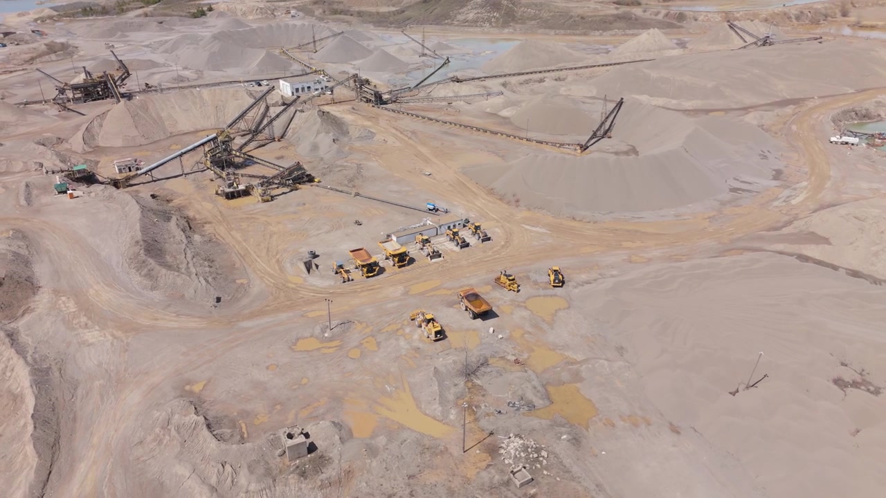 Industrial Machinery At Gravel Mining Operation In Caledon Village, Ontario, Canada. Aerial Rotate Shot