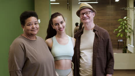 couple and teacher smiling