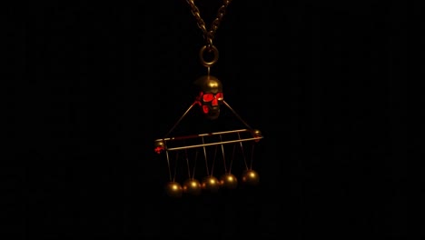 collar de cráneo de oro con la cuna de newton