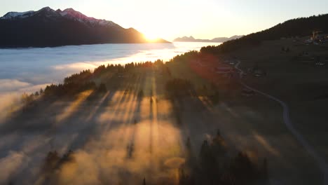 sunset and clouds over mountainous countryside