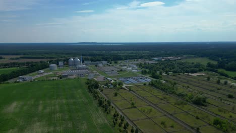 wastewater treatment plant aerial view, demonstrating water purification process, ensuring environmental sustainability and resource management. unique aerial view flight wide orbit overview drone