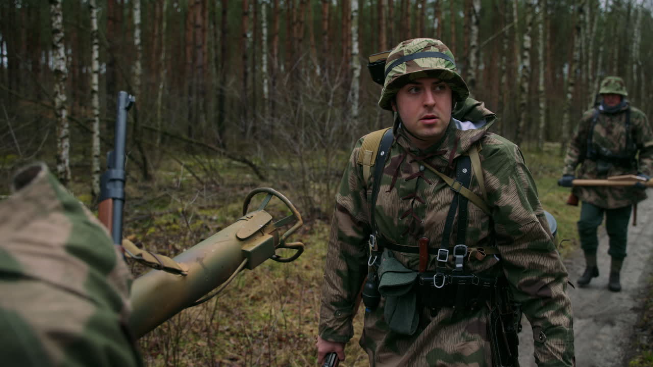 World War II German Soldiers Marching Through Forest