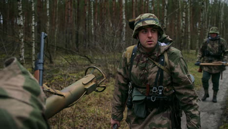 world war ii german soldiers marching through forest