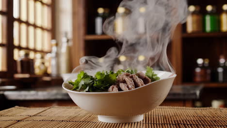 steaming bowl of beef noodle soup