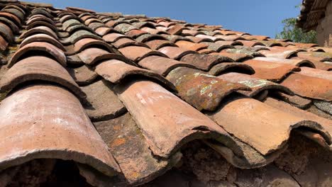 Slow-motion-footage-of-traditional-rooftops-of-clay-tiles-in-a-small-Andean-village-in-Peru