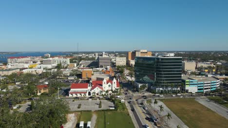 aerial view of downtown city with church