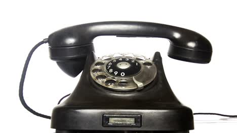 the vintage black phone comes and rings and then leaves loop