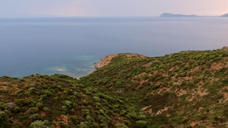 Sardaignan-shore-and-sea,-view-from-a-drone-by-sunset