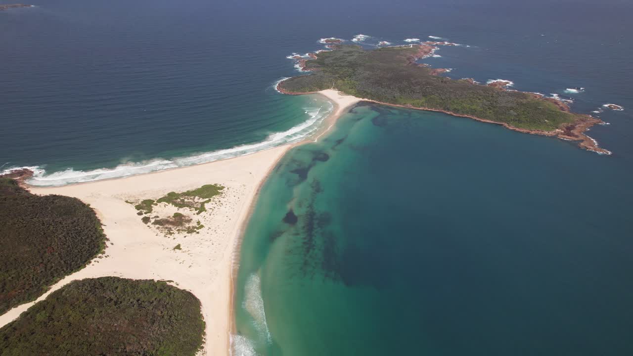 Aerial View Of Fingal Island Connected To Fingal Beach By Sand Spit In New South Wales, Australia.