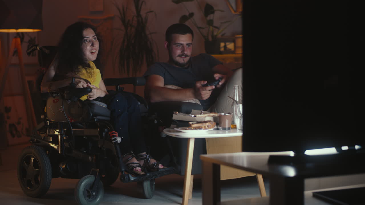 Couple Gaming and Relaxing at Home