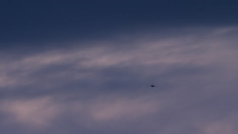 airplane flying above the clouds