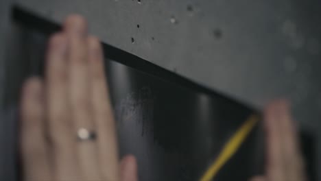 person climbing a concrete wall