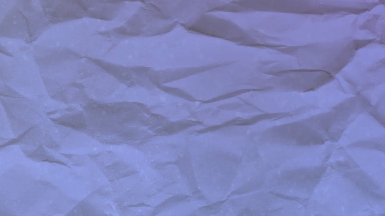 Animation of blue creased paper moving