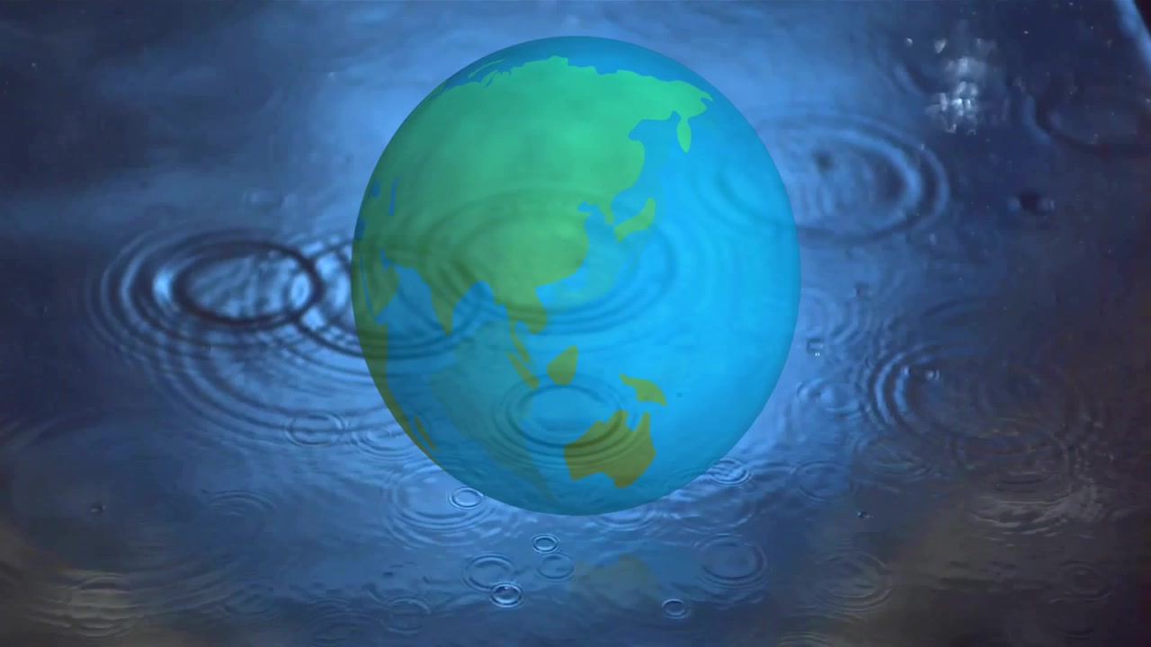 波立つ水面の上に浮かぶ地球儀