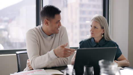 Businessman,-woman-and-laptop-in-office