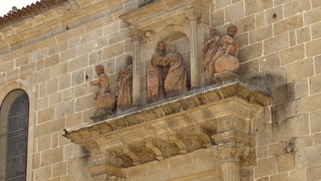 misericordia church sculptures on the side wall of historic building in braga, portugal