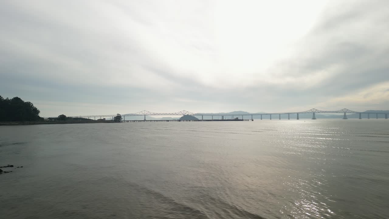 Sweeping drone footage captures the Richmond–San Rafael Bridge and Point Molate Beach’s coastline.