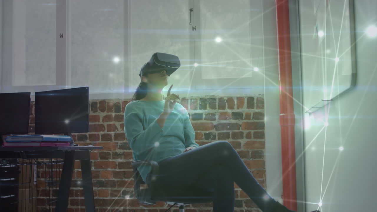 Animation of network of connections over businesswoman using vr headset in office
