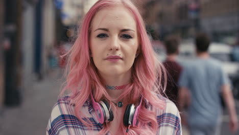 slow motion portrait of caucasian girl with pink hair in city