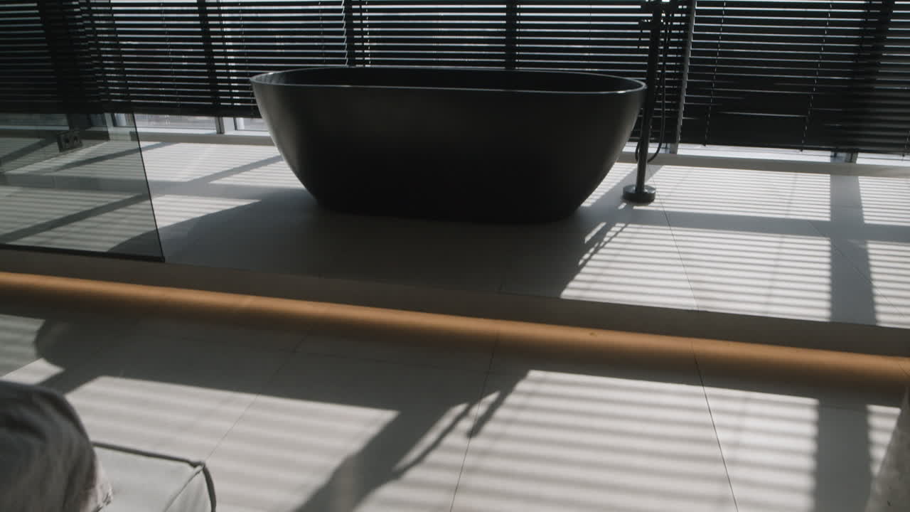 Modern Black Bathtub Bathroom with Window and Blinds